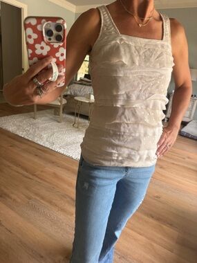 White House Black Market beige ruffle top with silver polka dots. Size XXS